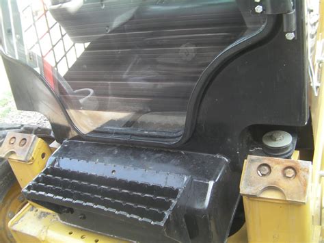 caterpillar skid steer cab enclosure|cat d series door enclosure.